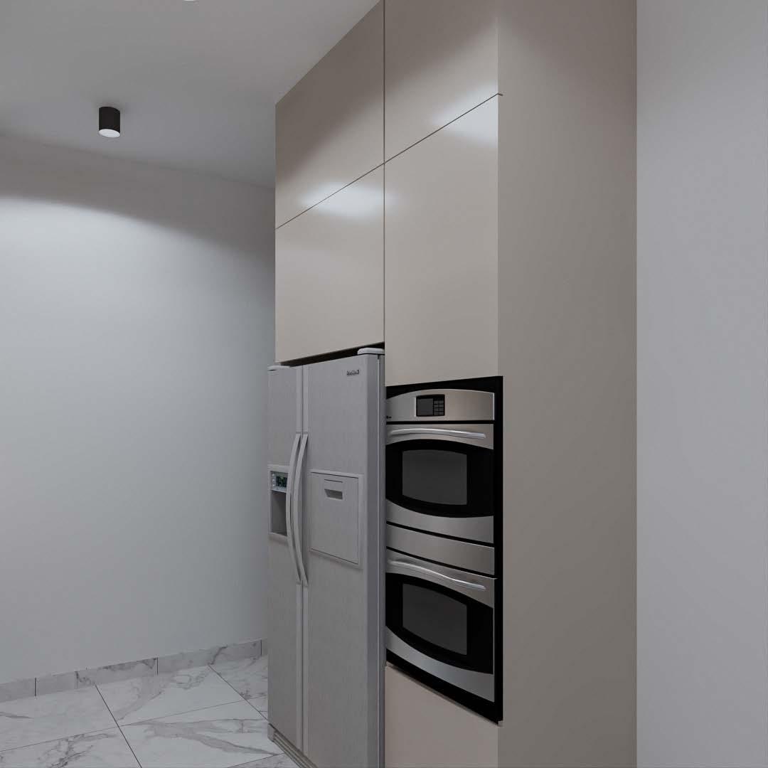 Tall kitchen units with an American-style fridge-freezer and double wall oven