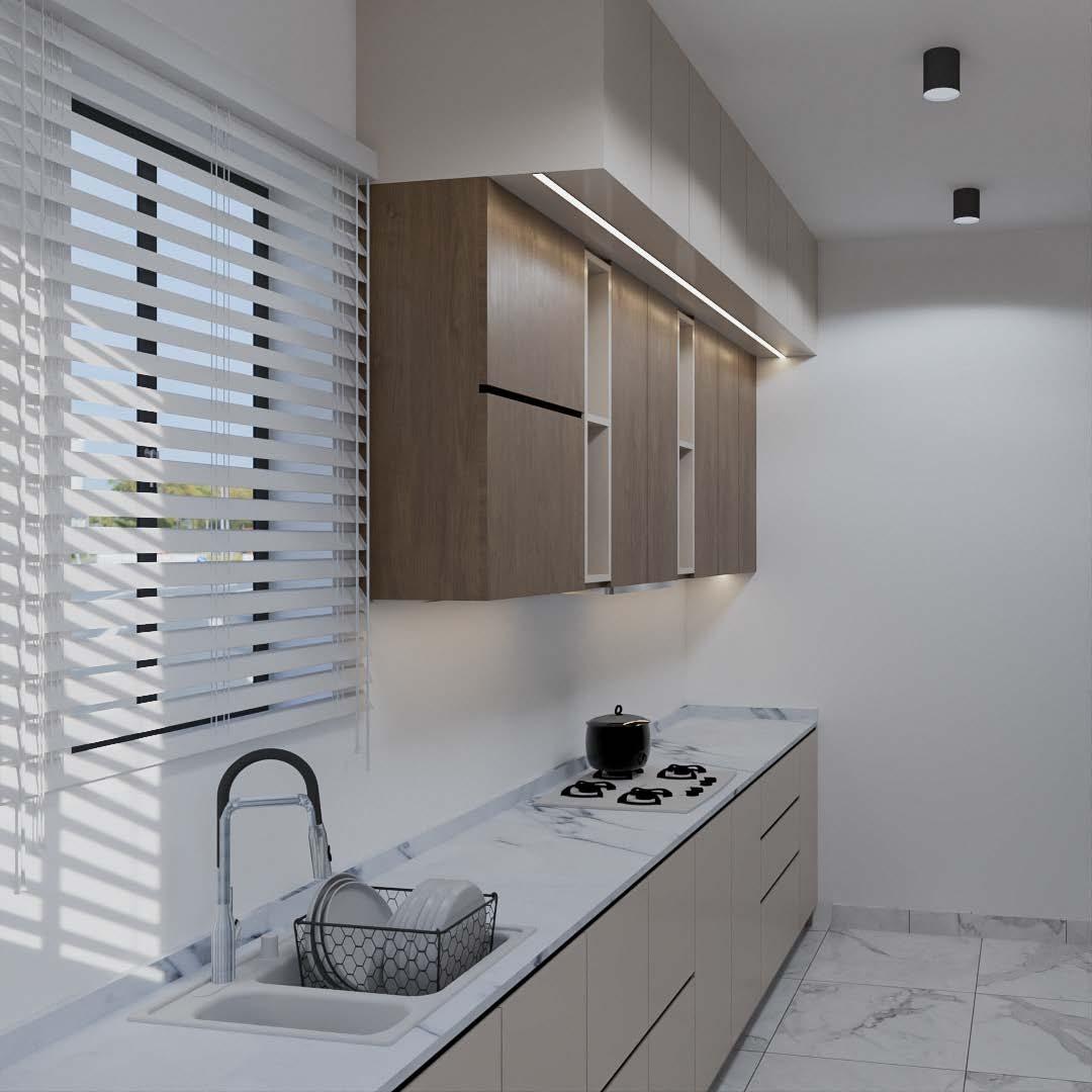Kitchen sink beneath a window, with daylight falling through the blinds