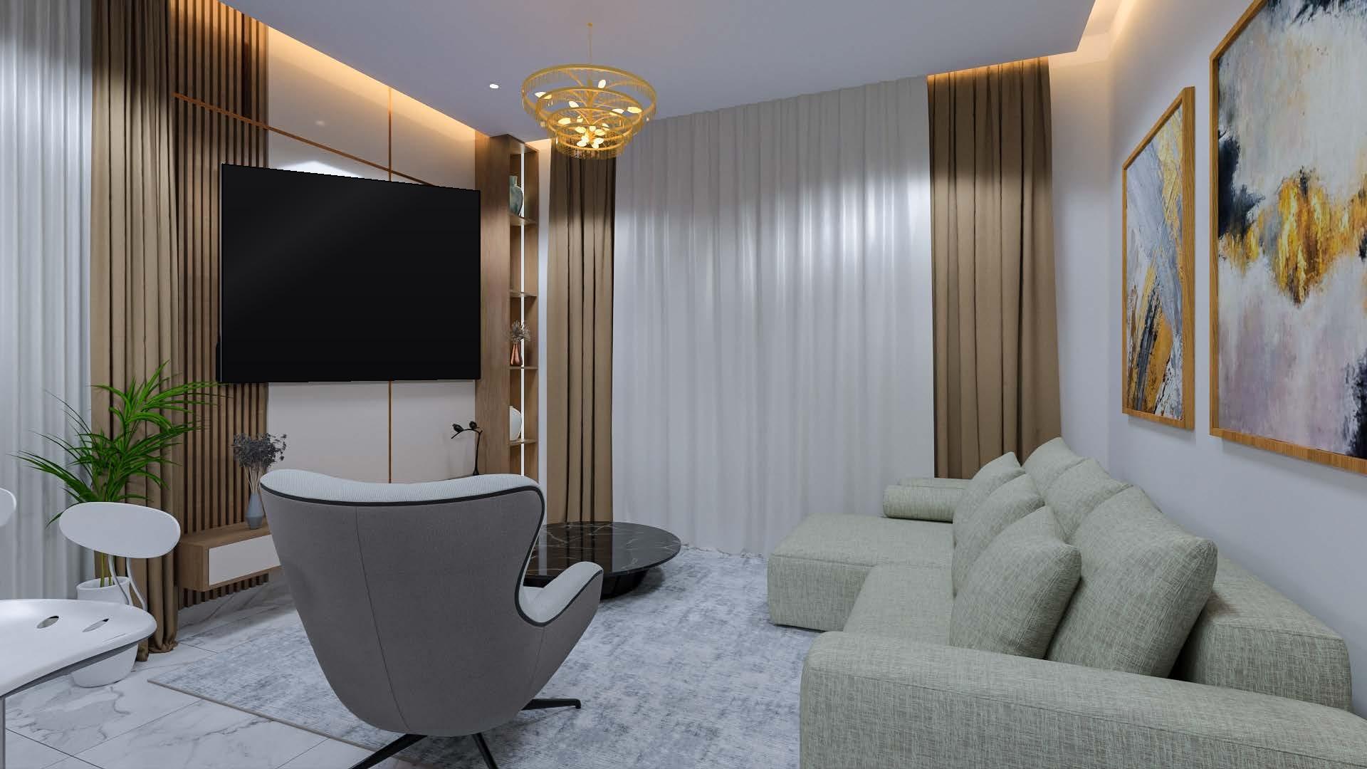 Penthouse living room with a sage sectional, a grey lounge chair and gold-leaf artworks
